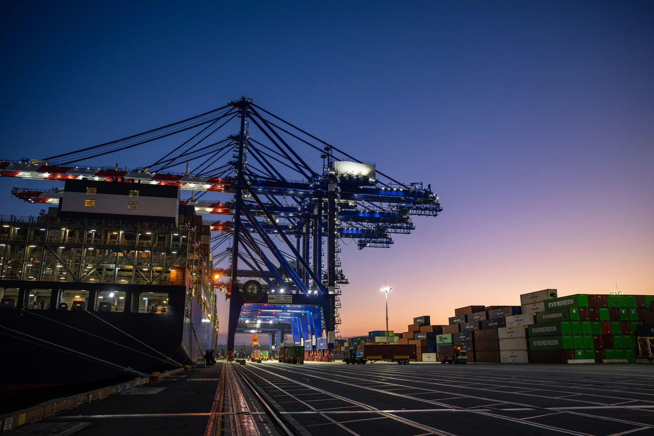 Container ship and cranes at an international cargo terminal